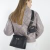 Black embossed monogram cross body bag