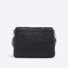 Black embossed monogram cross body bag