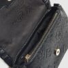 Black Embossed Monogram Cross Body Bag