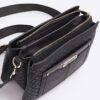 Black embossed monogram cross body bag