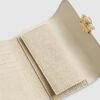 Cream Embossed Monogram Foldout Purse