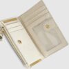 Cream Embossed Monogram Mini Purse