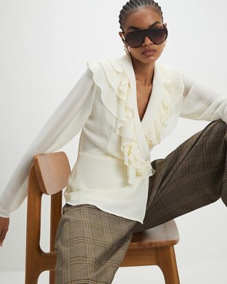 cream long sleeve wrap ruffle blouse 2 330x413 - Cream Long Sleeve Wrap Ruffle Blouse